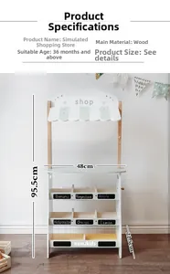 Detail of wooden kids' grocery store toy with white shelves and striped awning