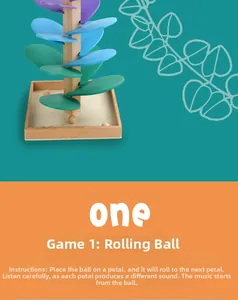 Detail of wooden musical marble tree toy with rainbow petals and marbles on wood base