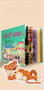 Detailed internal pages of a quiet book showing vehicle puzzles and interactive Velcro tabs