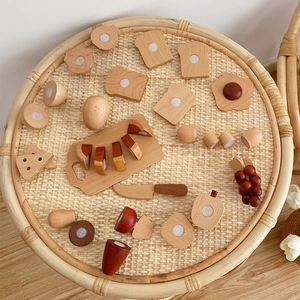 Close-up of wooden toy food set with velcro details on a rustic serving tray