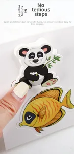 Detail of easy-peel animal stickers for kids busy book featuring panda and tropical fish
