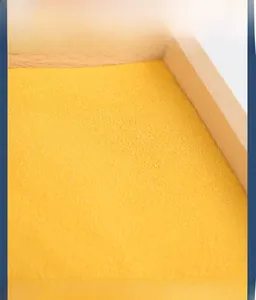 Macro shot of fine yellow sand and natural wood tray for children writing training