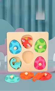 Macro detail of wooden 3D dinosaur egg puzzle showing colorful layers and easy-grip knobs