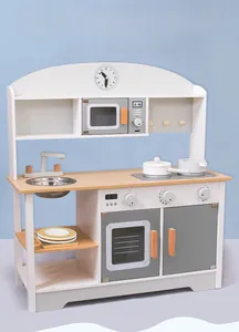 Detailed view of a white Japanese-style wooden play kitchen with an oven and microwave