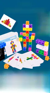 Macro shot of colorful plastic connector cubes with logic pattern cards and storage box