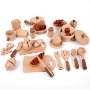 Wooden kids play kitchen set with toy food, cutting board, and cooking utensils