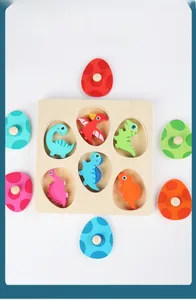 Detail showing 3D wooden dinosaur egg puzzle pieces with colorful sorting blocks and pegs