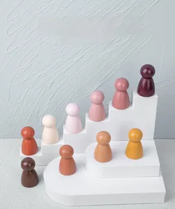 Set of 10 colorful wooden peg dolls in gradient colors for educational building play