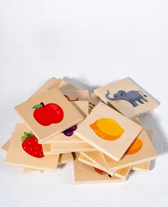 Detailed view of thick wooden puzzle blocks with colorful fruit and animal patterns