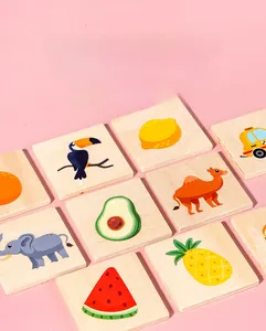Detailed view of heat-printed wooden blocks with animal and fruit patterns for kids