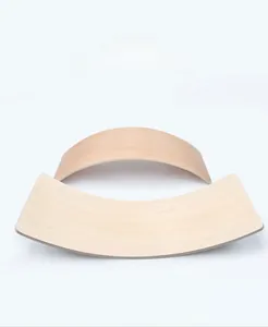 Close-up of wooden balance boards with natural grain for sensory training and yoga