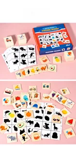 Macro shot of wooden shadow matching cards and colorful animal fruit puzzles for kids