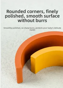 Close-up of smooth, rounded edges on rainbow wooden blocks for child safety