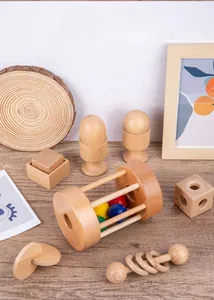 Macro shot of Montessori wooden baby rattle toys with smooth finish for safe grasping