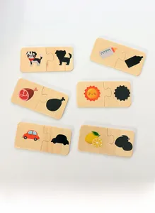 Macro detail of wooden shadow matching puzzles showing animal patterns and safety rounded edges