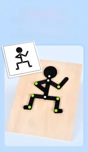 Detail of wooden logic puzzle showing a flexible mannequin with green joints for kids