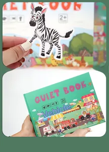 Detail of vehicle-themed quiet book for kids with rounded corners and velcro stickers