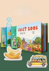 Macro detail of toddler busy book with animal stickers and cognitive matching cards