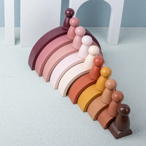 10-layer wooden rainbow stacking blocks with matching figures in Morandi earth tones
