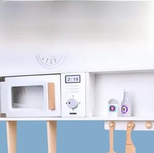 Detail of wooden play kitchen featuring non-toxic water-based paint and printed patterns