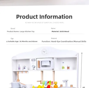 Macro detail of white wooden play kitchen set with toy pots and pretend vegetables