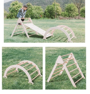 Detail of wooden indoor climbing triangle set with reversible slide and climbing arch board