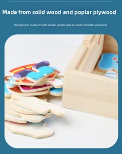 Detail of wooden storage box and poplar plywood puzzle pieces with colorful elephant patterns