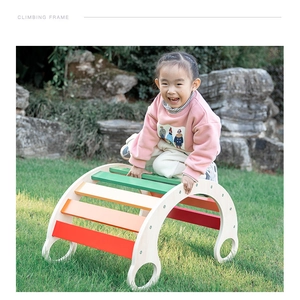 Wooden climbing frame with rainbow rungs for indoor and outdoor sensory training play