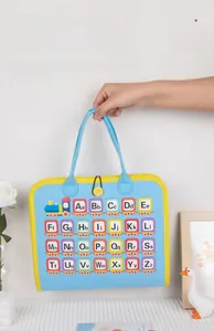 Close-up of portable felt busy board featuring alphabet train letters for early learning