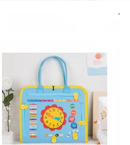 Detail of Montessori busy board with calendar, clock, and weather learning tools for kids