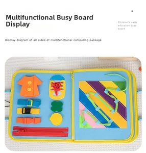 Detail of felt busy board featuring colorful zippers, buttons, and buckles for skill training