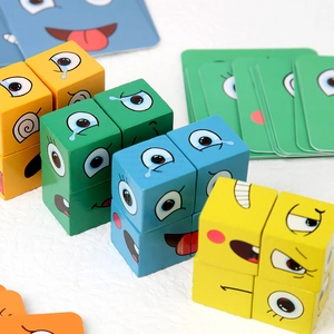 Educational wooden face-changing expression block puzzle game with colorful cubes and cards
