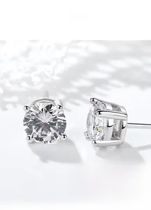 Macro view showing the classic four-prong setting and sparkle cut of S925 silver stud earrings