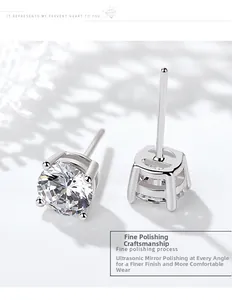 Detail of 925 sterling silver four-claw earrings featuring a polished mirror finish and round cut stone