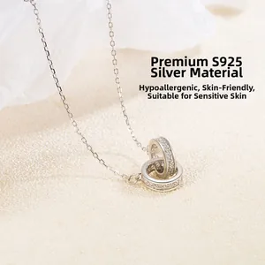 Close-up of S925 sterling silver interlocking rings necklace with sparkling pavé zircons