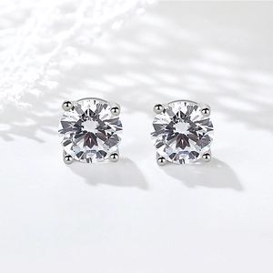 Elegant 925 sterling silver four-prong stud earrings with round brilliant cut diamonds
