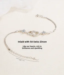 Detail of S925 sterling silver interlocking hearts bracelet with sparkling cubic zirconia