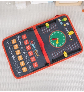 Detailed view of kids Montessori busy board with alphabet letters and a clock dial