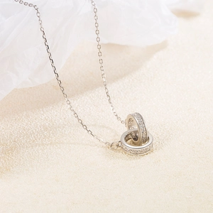 S925 sterling silver Mobius necklace with interlocking pave zircon rings in minimalist style