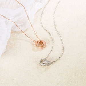 Interlocking S925 sterling silver Mobius rings necklace in rose gold and silver finishes