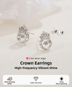 Close-up of S925 sterling silver crown earrings with dancing cubic zirconia stones