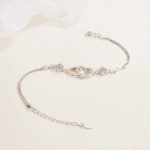 Elegant S925 sterling silver heart-to-heart bracelet with zircon insets and snake chain