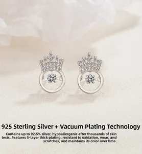 Macro detail of S925 sterling silver crown studs featuring a dancing cubic zirconia stone