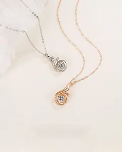 Macro view showing silver and rose gold S925 phoenix necklaces with sparkling zircon pendants