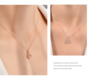 Detailed comparison of silver and rose gold intertwined heart necklaces with dancing stones