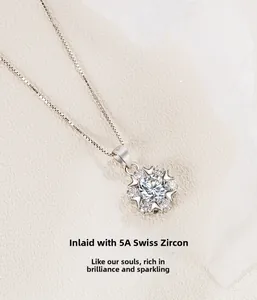 Macro shot of S925 sterling silver necklace featuring 5A Swiss zircon snowflake pendant
