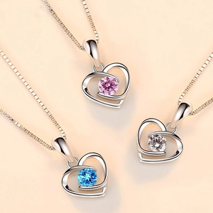 Minimalist sterling silver heart necklace set with colorful zircon stones in three colors