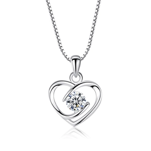 Sterling silver heart necklace with sparkling round center stone on white background