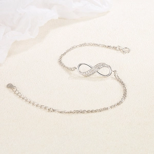 S925 Sterling Silber Unendlichkeit Armband mit Zirkonia und Herzanhänger für Damen