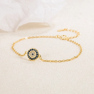 Detailed view of S925 sterling silver evil eye bracelet with blue and white zircons
